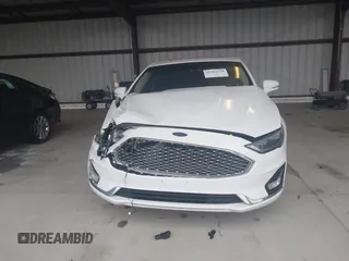 2019 Ford Fusion Titanium with VIN 3FA6P0K95KR271291, listed as a IAAI auction lot 41983320 with 71,962 mi miles and . Bid and sale history available at DreamBid. Image 12.