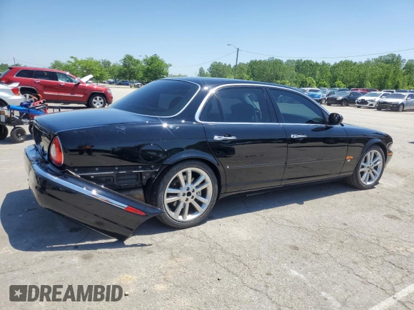 2004 Jaguar XJ с VIN SAJEA73B34TG10749, выставлен на аукционе Copart как лот 56574025 с пробегом 72 240 миль миль и Списание • Salvage title. История ставок и продаж доступна на DreamBid. Изображение 3.