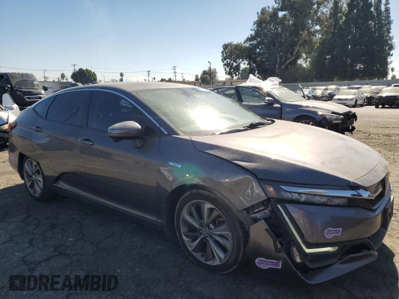 2018 Honda Clarity Plug-In Hybrid with VIN JHMZC5F17JC018537, listed as a Copart auction lot 77413144 with 74,350 mi miles and Salvage Title. Bid and sale history available at carsss.com. Image 4.