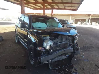 2014 Jeep Patriot Sport with VIN 1C4NJPBB7ED915924, listed as a IAAI auction lot 41641555 with 131,732 mi miles. Bid and sale history available at carsss.com. Image 1.