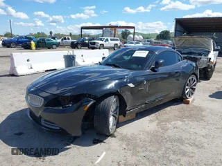 2011 BMW Z4 sDrive35i with VIN WBALM7C58BE383710, listed as a IAAI auction lot 41953452 with 102,510 mi miles. Bid and sale history available at carsss.com. Image 6.
