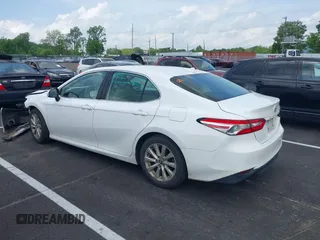 2019 Toyota Camry LE with VIN 4T1B11HK2KU743445, listed as a IAAI auction lot 42129688 with 284,938 mi miles and . Bid and sale history available at DreamBid. Image 14.
