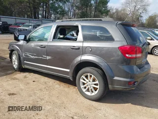 2015 Dodge Journey SXT with VIN 3C4PDCBG0FT733952, listed as a IAAI auction lot 41521687 with 80,974 mi miles and . Bid and sale history available at DreamBid. Image 3.