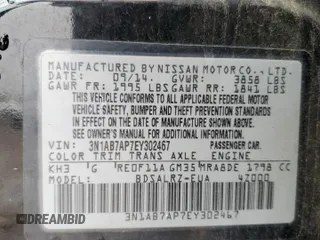 2014 Nissan Sentra SR z VIN 3N1AB7AP7EY302467, wystawiony jako Copart lot #56423835 z przebiegiem 118 520 mil mil oraz Szkoda całkowita • Salvage title. Historia ofert i sprzedaży dostępna na DreamBid. Obrazek 13.