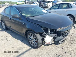 2014 Kia Optima EX with VIN 5XXGN4A70EG277871, listed as a IAAI auction lot 42183248 with 128,300 mi miles and . Bid and sale history available at carsss.com. Image 1.