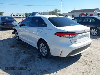 2022 Toyota Corolla LE with VIN JTDEPMAE8NJ209121, listed as a IAAI auction lot 39179770 with 41,893 mi miles and . Bid and sale history available at carsss.com. Image 3.
