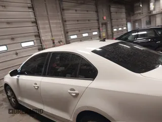 2011 Volkswagen Jetta SE with VIN 3VWDX7AJXBM315916, listed as a IAAI auction lot 42311284 with 207,297 mi miles and . Bid and sale history available at DreamBid. Image 14.
