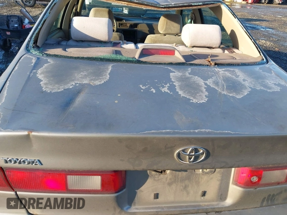 1997 Toyota Camry LE z VIN 4T1BG22K0VU019383, wystawiony jako IAAI lot #41271457 z przebiegiem 175 214 mil mil oraz . Historia ofert i sprzedaży dostępna na DreamBid. Obrazek 13.