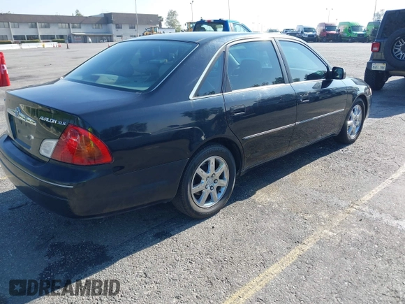 2000 Toyota Avalon XL with VIN 4T1BF28BXYU087172, listed as a IAAI auction lot 42000095 with 120,296 mi miles and . Bid and sale history available at DreamBid. Image 4.