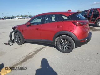 2017 Mazda CX-3 Touring z VIN JM1DKDC75H0170331, wystawiony jako Copart lot #51997455 z przebiegiem 141 405 mil mil oraz Szkoda całkowita • Salvage title. Historia ofert i sprzedaży dostępna na DreamBid. Obrazek 2.