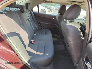 2012 Ford Fusion SE z VIN 3FAHP0HA7CR387524, wystawiony jako Copart lot #62083235 z przebiegiem 104 698 mil mil oraz Szkoda całkowita • Salvage title. Historia ofert i sprzedaży dostępna na DreamBid. Obrazek 10.
