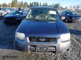 2004 Ford Escape XLT with VIN 1FMYU03134KA30806, listed as a IAAI auction lot 41449933 with 137,897 mi miles. Bid and sale history available at carsss.com. Image 12.