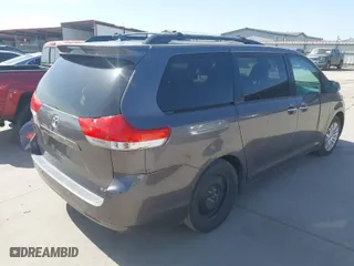 2012 Toyota Sienna XLE AAS with VIN 5TDYK3DC4CS216695, listed as a IAAI auction lot 41731768 with 186,362 mi miles. Bid and sale history available at carsss.com. Image 4.