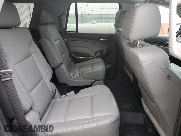 2019 Chevrolet Tahoe LT with VIN 1GNSKBKCXKR212450, listed as a Copart auction lot 54433205 with 119,907 mi miles and Salvage title. Bid and sale history available at DreamBid. Image 11.