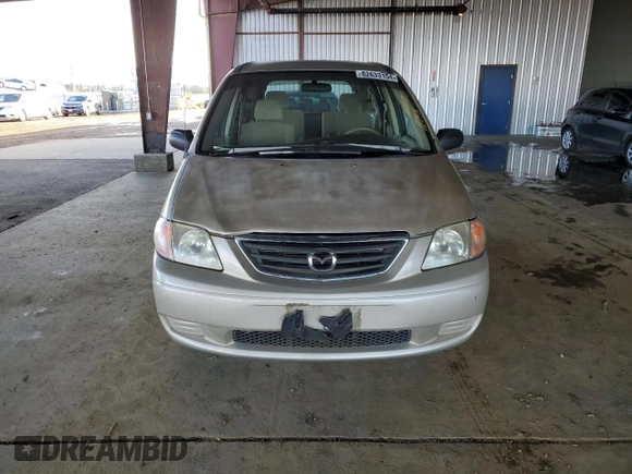 2000 Mazda MPV DX with VIN JM3LW28G8Y0142883, listed as a Copart auction lot 82633154 with 161,196 mi miles and Salvage title. Bid and sale history available at DreamBid. Image 5.
