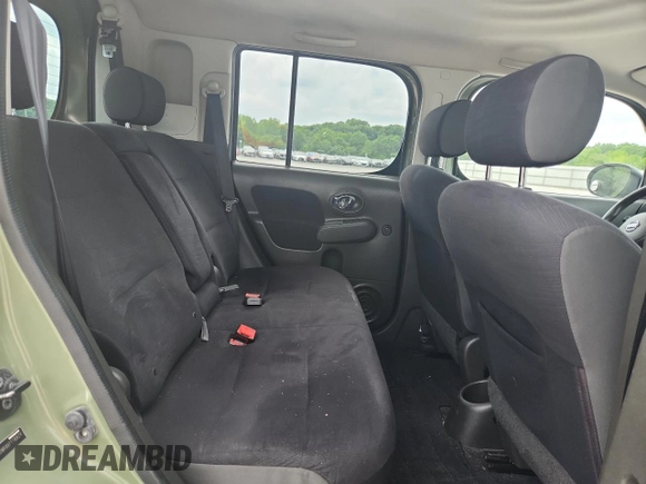 2009 Nissan Cube SL z VIN JN8AZ28R99T116824, wystawiony jako Copart lot #57515845 z przebiegiem 271 001 mil mil oraz Szkoda całkowita • Salvage title. Historia ofert i sprzedaży dostępna na DreamBid. Obrazek 10.