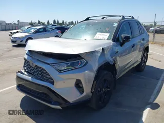 2021 Toyota RAV4 Hybrid XSE with VIN 4T3E6RFV6MU040399, listed as a IAAI auction lot 42020866 with 46,593 mi miles and . Bid and sale history available at DreamBid. Image 2.