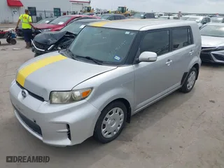 2012 Scion xB with VIN JTLZE4FE0CJ012235, listed as a IAAI auction lot 41894195 with 196,970 mi miles. Bid and sale history available at carsss.com. Image 2.
