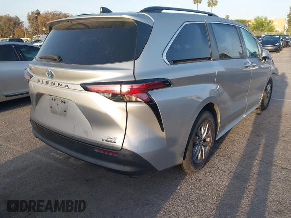 2021 Toyota Sienna XLE with VIN 5TDYRKEC2MS074448, listed as a IAAI auction lot 41946030 with 122,509 mi miles and . Bid and sale history available at DreamBid. Image 4.