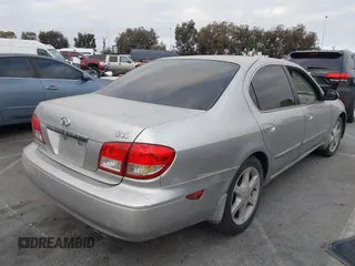 2003 Infiniti I35 Luxury with VIN JNKDA31A73T112643, listed as a IAAI auction lot 41896135 with 145,011 mi miles. Bid and sale history available at carsss.com. Image 4.