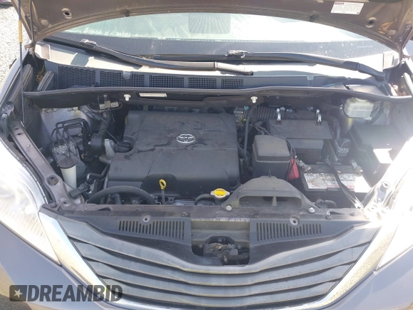 2014 Toyota Sienna XLE with VIN 5TDYK3DC5ES451965, listed as a IAAI auction lot 41879334 with 145,114 mi miles and . Bid and sale history available at DreamBid. Image 10.