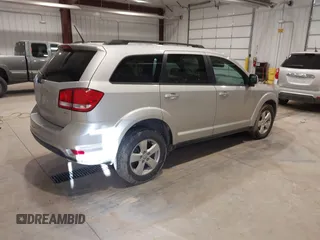 2012 Dodge Journey SXT z VIN 3C4PDDBGXCT257498, wystawiony jako IAAI lot #41746098 z przebiegiem 197 796 mil mil oraz . Historia ofert i sprzedaży dostępna na DreamBid. Obrazek 4.