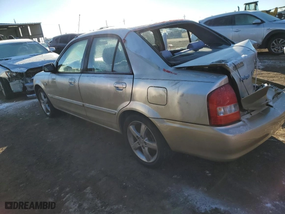 2002 Mazda Protege DX with VIN JM1BJ225721631710, listed as a Copart auction lot 87837975 with 207,228 mi miles and Salvage Title. Bid and sale history available at carsss.com. Image 2.