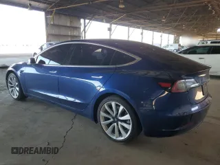 2020 Tesla Model 3 Standard Range Plus z VIN 5YJ3E1EA1LF744069, wystawiony jako Copart lot #53437085 z przebiegiem 121 845 mil mil oraz Szkoda całkowita • Salvage title. Historia ofert i sprzedaży dostępna na DreamBid. Obrazek 2.