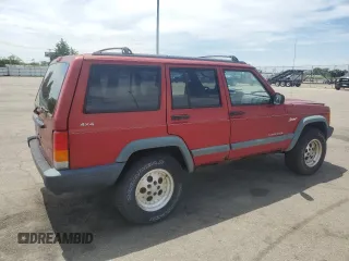 1998 Jeep Cherokee Sport with VIN 1J4FJ68S2WL285432, listed as a Copart auction lot 57183145 with 284,162 mi miles and Clean title. Bid and sale history available at DreamBid. Image 3.