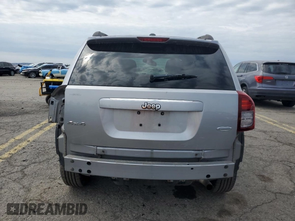 2014 Jeep Compass Latitude with VIN 1C4NJDEB4ED788348, listed as a Copart auction lot 52885935 with 86,282 mi miles and Salvage Title. Bid and sale history available at DreamBid. Image 6.