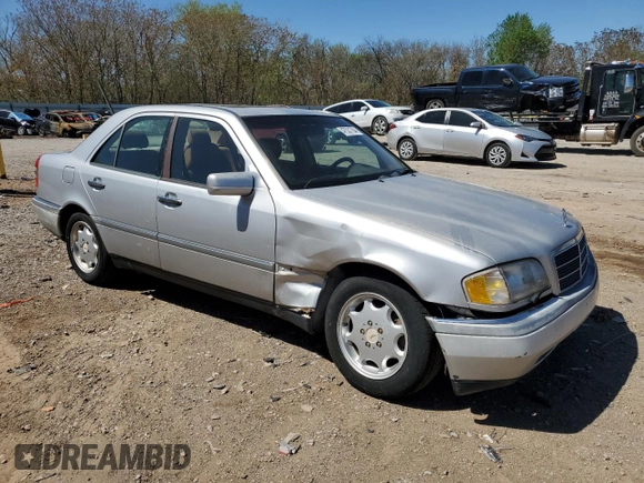 1995 Mercedes-Benz C with VIN WDBHA28E7SF255142, listed as a Copart auction lot 68411704 with 334,000 mi miles and Salvage Title. Bid and sale history available at carsss.com. Image 4.