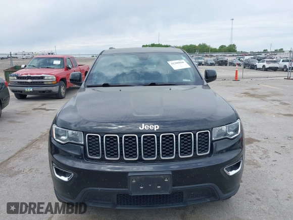 2018 Jeep Grand Cherokee Laredo E with VIN 1C4RJFAG6JC335606, listed as a IAAI auction lot 42280666 with 113,438 mi miles and . Bid and sale history available at DreamBid. Image 6.