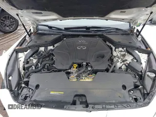 2020 Infiniti Q50 Red Sport 400 with VIN JN1FV7AR0LM660315, listed as a IAAI auction lot 41951851 with 102,475 mi miles and . Bid and sale history available at carsss.com. Image 10.