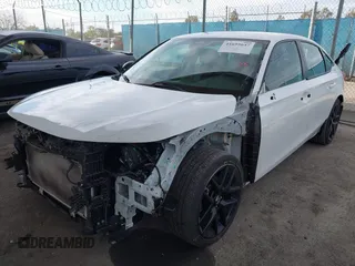2022 Honda Civic Sport z VIN 2HGFE2F5XNH606629, wystawiony jako IAAI lot #41695647 z przebiegiem 58 128 mil mil oraz . Historia ofert i sprzedaży dostępna na DreamBid. Obrazek 23.