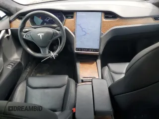 2020 Tesla Model S Long Range с VIN 5YJSA1E28LF390602, выставлен на аукционе Copart как лот 63778115 с пробегом 39 802 миль миль и Списание • Salvage title. История ставок и продаж доступна на DreamBid. Изображение 8.