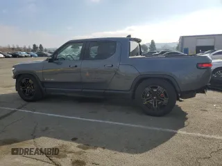 2022 Rivian R1T Adventure Package with VIN 7FCTGAAA7NN006498, listed as a Copart auction lot 89338075 with 46,384 mi miles and Salvage Title. Bid and sale history available at carsss.com. Image 2.