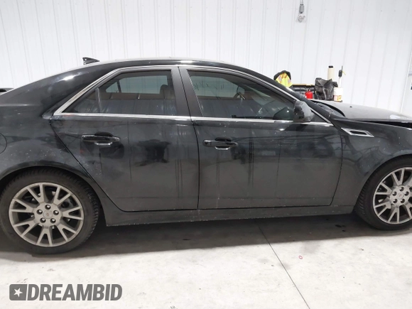 2013 Cadillac CTS Premium z VIN 1G6DS5E34D0103328, wystawiony jako IAAI lot #41501406 z przebiegiem 157 633 mil mil oraz . Historia ofert i sprzedaży dostępna na DreamBid. Obrazek 13.