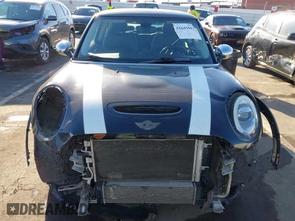 2014 MINI Hardtop S z VIN WMWXM7C59ET970371, wystawiony jako IAAI lot #41643992 z przebiegiem 123 813 mil mil oraz . Historia ofert i sprzedaży dostępna na DreamBid. Obrazek 6.
