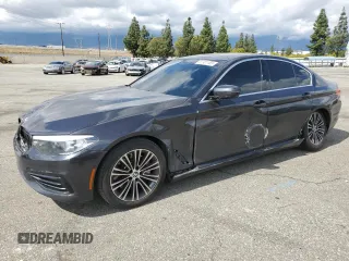 2019 BMW 5 Series 530i with VIN WBAJA5C57KWW33498, listed as a Copart auction lot 51301155 with 74,940 mi miles and Salvage title. Bid and sale history available at DreamBid. Image 1.