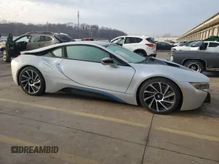 2015 BMW i8 z VIN WBY2Z2C56FV674231, wystawiony jako Copart lot #37218014 z przebiegiem 27 465 mil mil oraz . Historia ofert i sprzedaży dostępna na DreamBid. Obrazek 4.