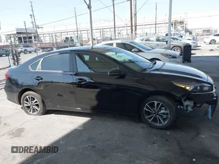 2024 Kia Forte LXS with VIN 3KPF24AD3RE840663, listed as a IAAI auction lot 41858540 with 4,551 mi miles and . Bid and sale history available at DreamBid. Image 12.