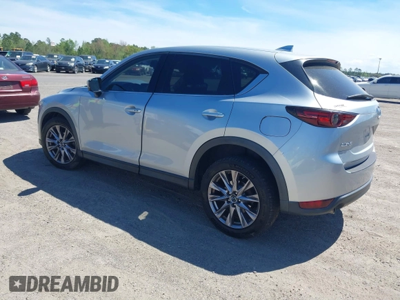 2019 Mazda CX-5 Grand Touring with VIN JM3KFADM1K1606082, listed as a IAAI auction lot 41875878 with 66,089 mi miles. Bid and sale history available at carsss.com. Image 3.