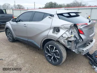 2019 Toyota C-HR XLE with VIN NMTKHMBX0KR082023, listed as a IAAI auction lot 41606867 with 52,814 mi miles. Bid and sale history available at carsss.com. Image 3.