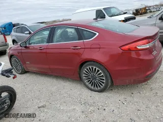 2017 Ford Fusion Energi SE with VIN 3FA6P0PU1HR105100, listed as a Copart auction lot 68935042 with 52,459 mi miles. Bid and sale history available at carsss.com. Image 2.