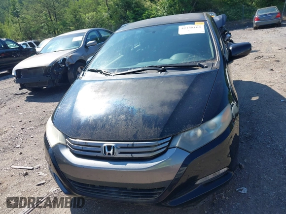 2010 Honda Insight LX with VIN JHMZE2H5XAS018840, listed as a IAAI auction lot 42138165 with 188,467 mi miles and . Bid and sale history available at DreamBid. Image 6.