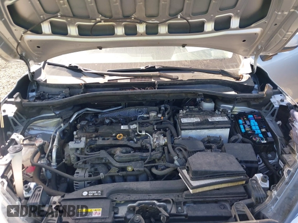 2022 Toyota Corolla Cross LE z VIN 7MUCAABG1NV021010, wystawiony jako IAAI lot #42082415 z przebiegiem 30 395 mil mil oraz . Historia ofert i sprzedaży dostępna na DreamBid. Obrazek 10.