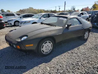 1985 Porsche 928 z VIN WP0JB0928FS861121, wystawiony jako Copart lot #76747554 z przebiegiem 73 056 mil mil oraz Tytuł czysty. Historia ofert i sprzedaży dostępna na DreamBid. Obrazek 1.