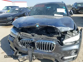 2016 BMW X1 xDrive28i with VIN WBXHT3Z35G4A49941, listed as a IAAI auction lot 41789774 with 111,661 mi miles and . Bid and sale history available at DreamBid. Image 6.