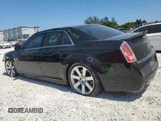 2012 Chrysler 300 SRT8 with VIN 2C3CCAFJXCH800724, listed as a Copart auction lot 49680465 with 87,279 mi miles and Salvage Title. Bid and sale history available at carsss.com. Image 2.