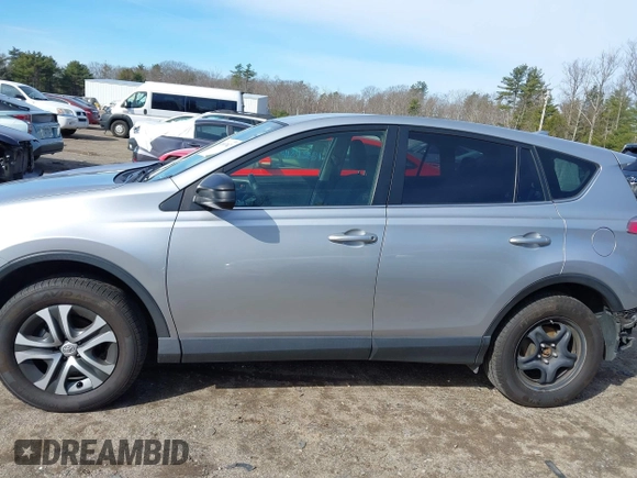 2018 Toyota RAV4 LE with VIN JTMBFREV8JJ224872, listed as a IAAI auction lot 41907962 with 104,605 mi miles and . Bid and sale history available at DreamBid. Image 14.